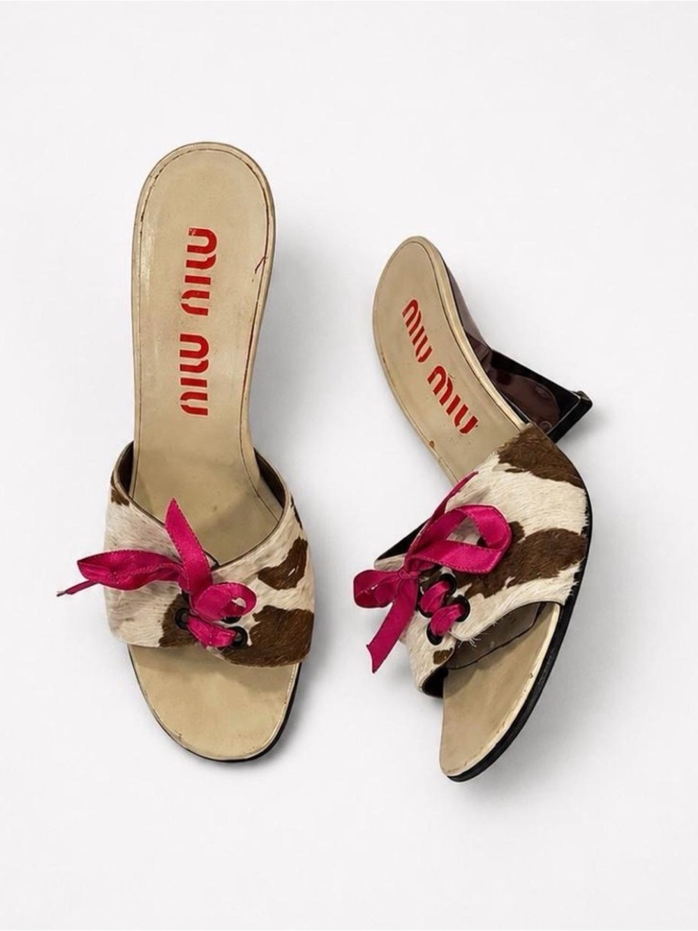Miu Miu Brown and White Cowhide Mules with Pink Ribbon